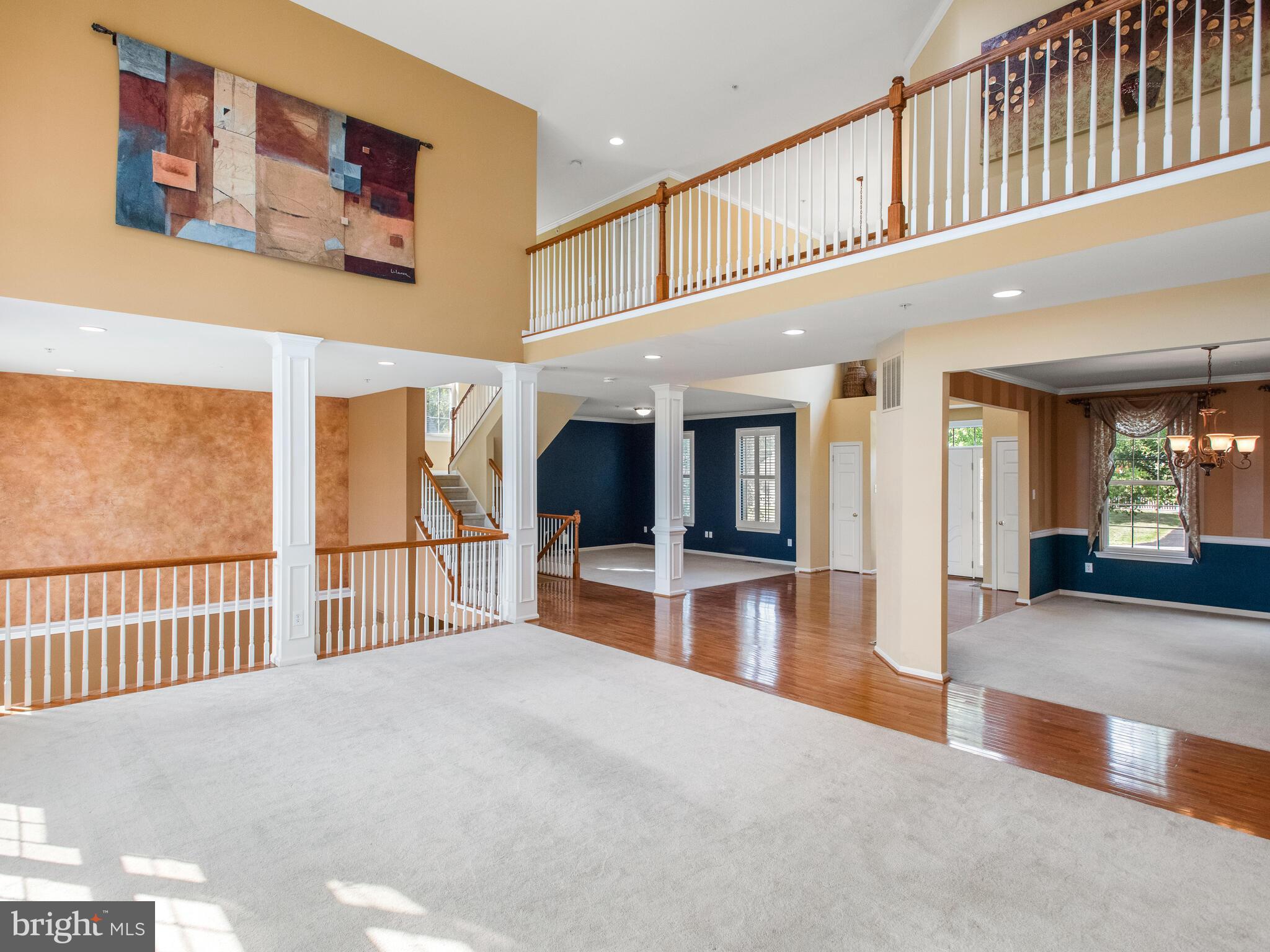 1180 Rupert Road Pottstown, PA 19464 - Photo 10 of 51 a view of a hallway with a large window and wooden floor