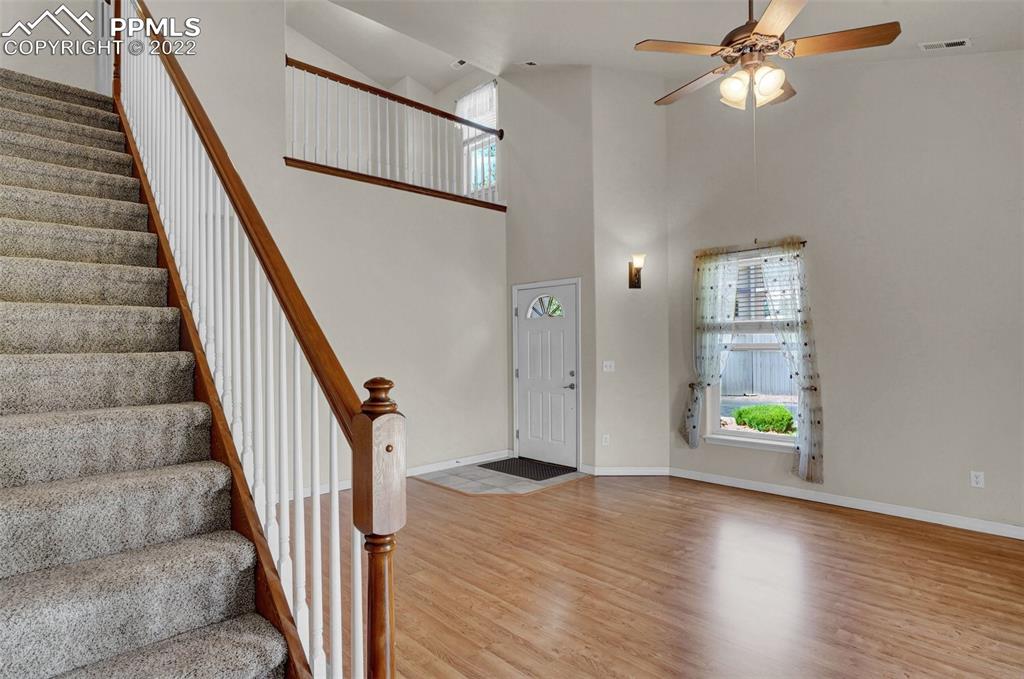 6578 Bethesda Point, Unit B Colorado Springs, CO 80918 - Photo 13 of 45 a view of an entryway with wooden floor