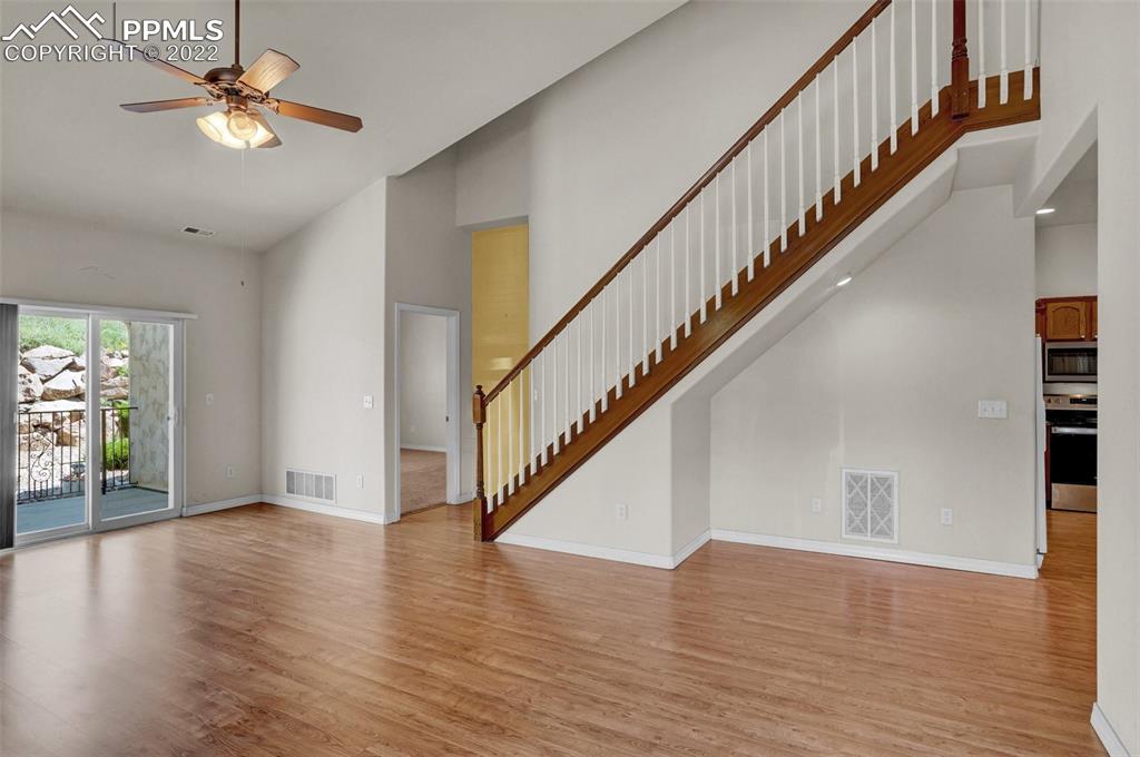 6578 Bethesda Point, Unit B Colorado Springs, CO 80918 - Photo 15 of 45 a view of an entryway with wooden floor