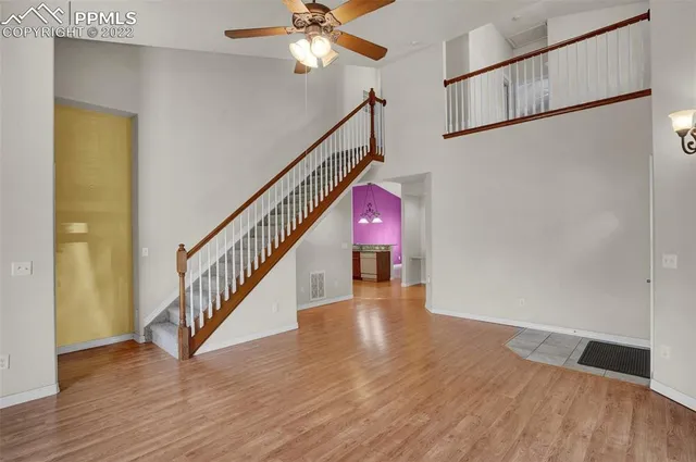 a view of entryway with wooden floor