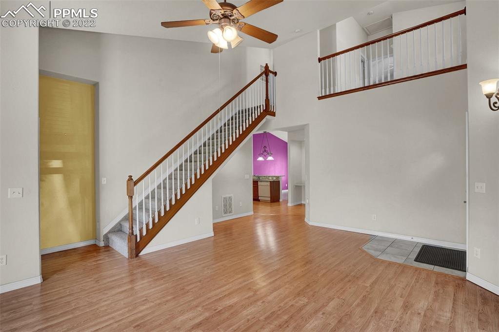 6578 Bethesda Point, Unit B Colorado Springs, CO 80918 - Photo 17 of 45 a view of entryway with wooden floor