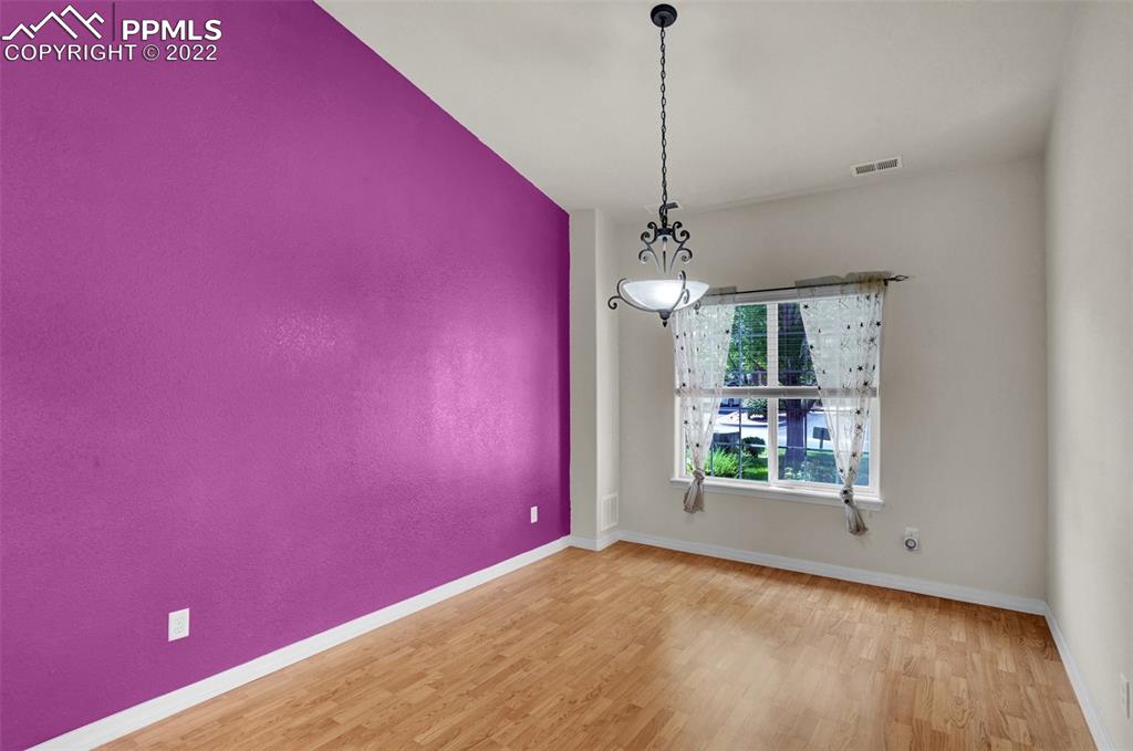 6578 Bethesda Point, Unit B Colorado Springs, CO 80918 - Photo 23 of 45 a view of a room with window and stairs