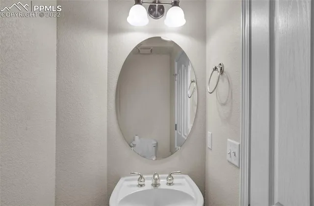 a close view of a chandelier in a bathroom