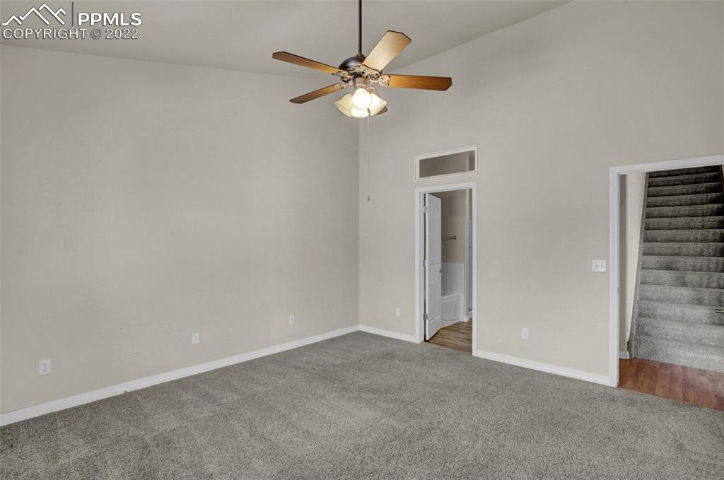 6578 Bethesda Point, Unit B Colorado Springs, CO 80918 - Photo 27 of 45 a view of an empty room with a window