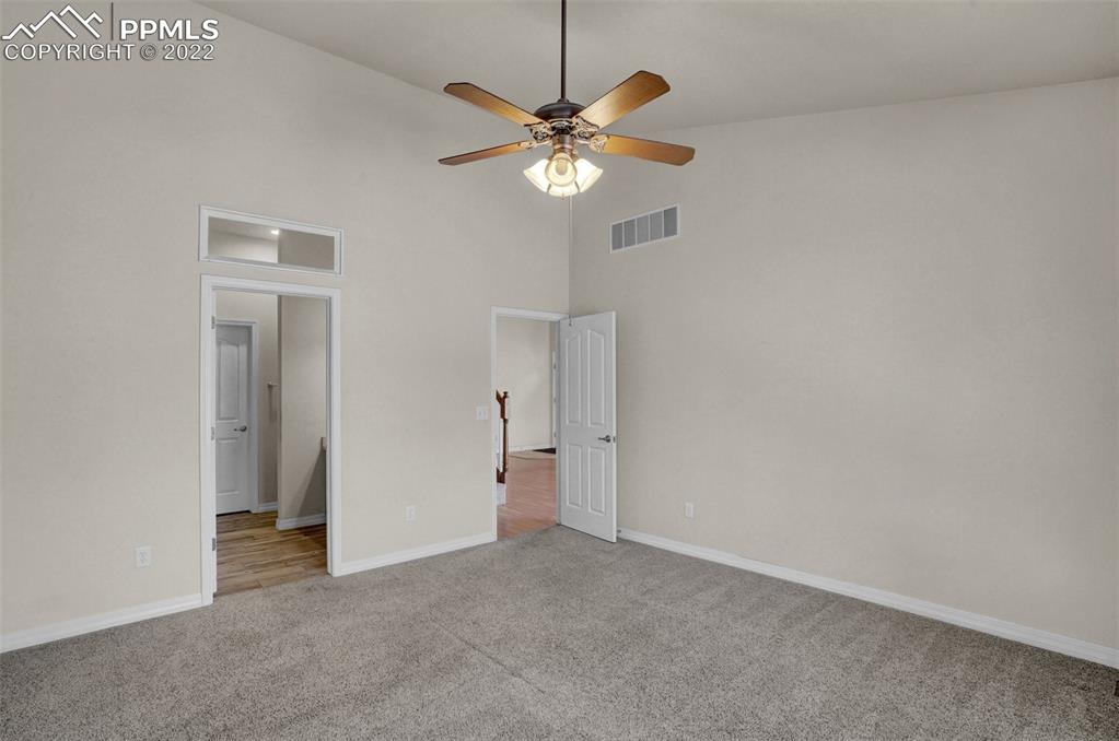 6578 Bethesda Point, Unit B Colorado Springs, CO 80918 - Photo 28 of 45 a view of room with window and ceiling fan