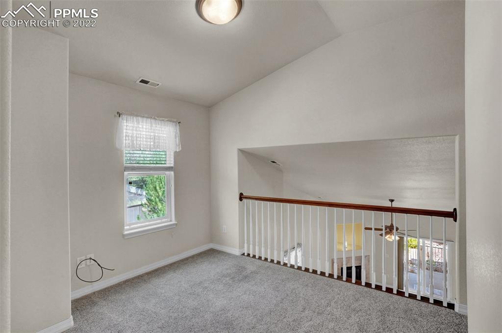 6578 Bethesda Point, Unit B Colorado Springs, CO 80918 - Photo 31 of 45 an empty room with windows