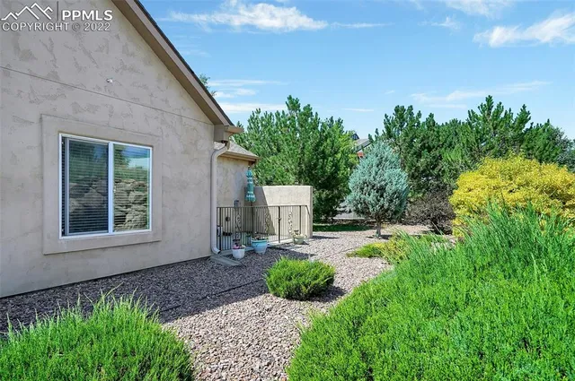 a view of a back yard of the house