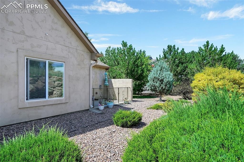 6578 Bethesda Point, Unit B Colorado Springs, CO 80918 - Photo 43 of 45 a view of a back yard of the house