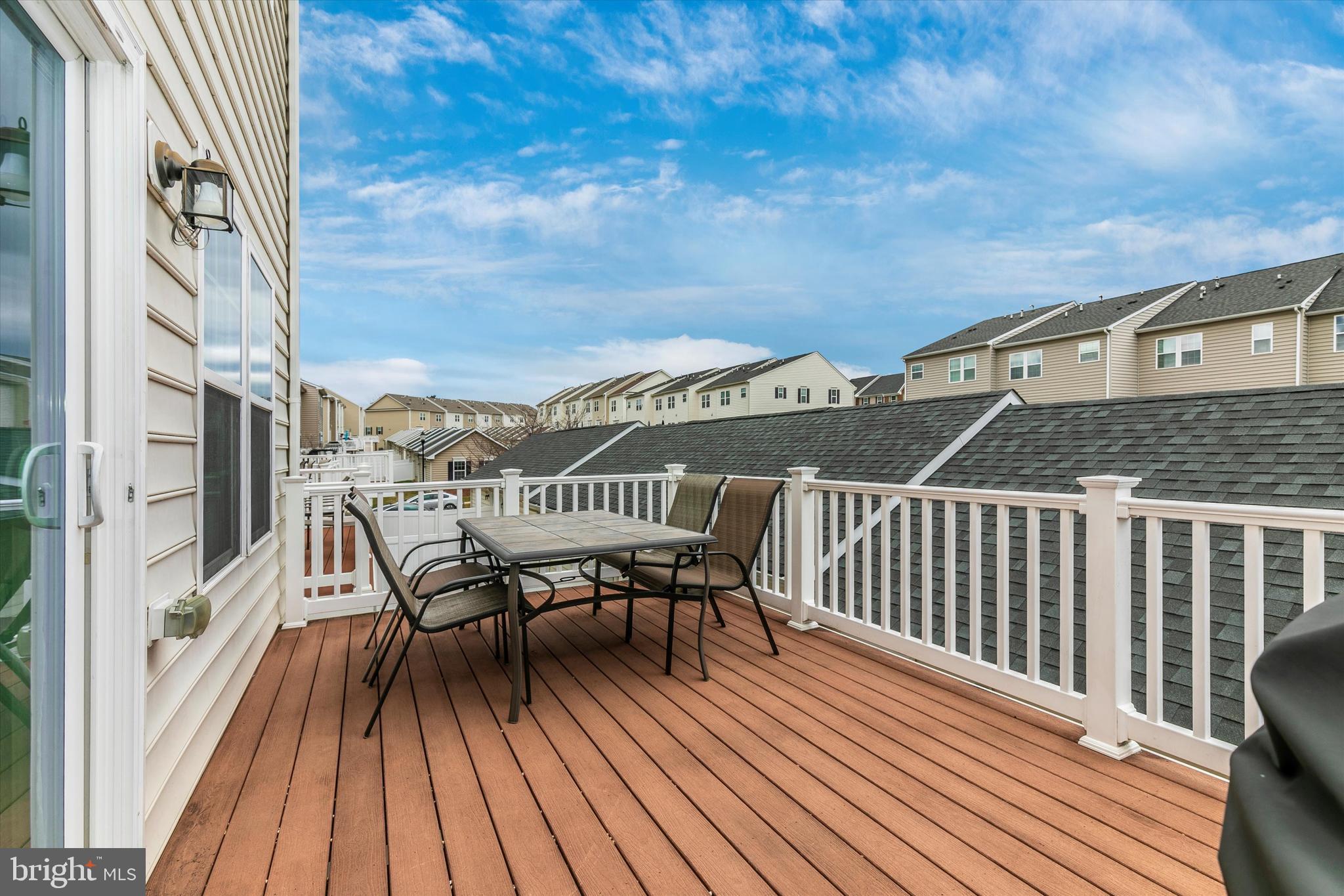 7821 Wormans Mill Road Frederick, MD 21701 - Photo 23 of 44 a view of balcony with furniture