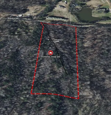 a view of a street with trees on both side of it