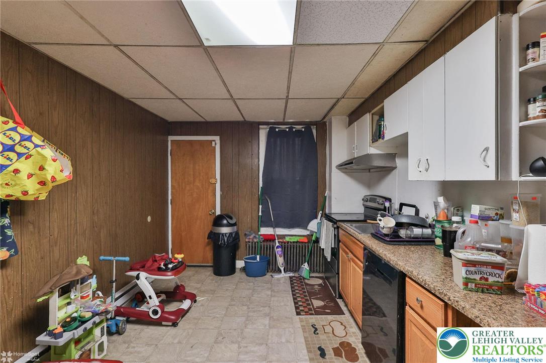 705 North Front Street Allentown, PA 18102 - Photo 11 of 44 a kitchen with furniture a refrigerator and a stove