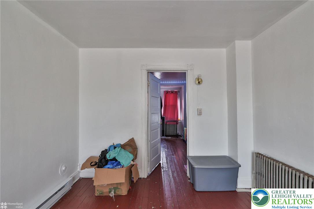 705 North Front Street Allentown, PA 18102 - Photo 23 of 44 a living room with furniture and a window