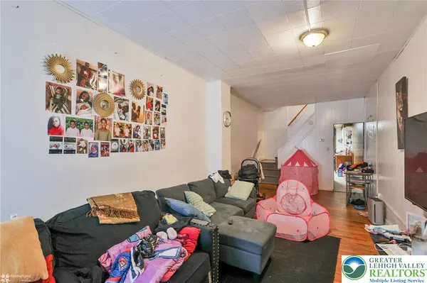 a living room with furniture and rug