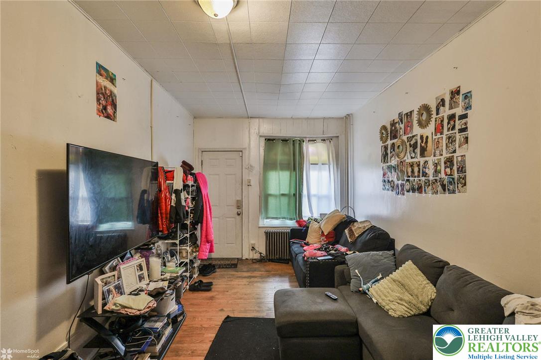 705 North Front Street Allentown, PA 18102 - Photo 8 of 44 a living room with furniture and a flat screen tv