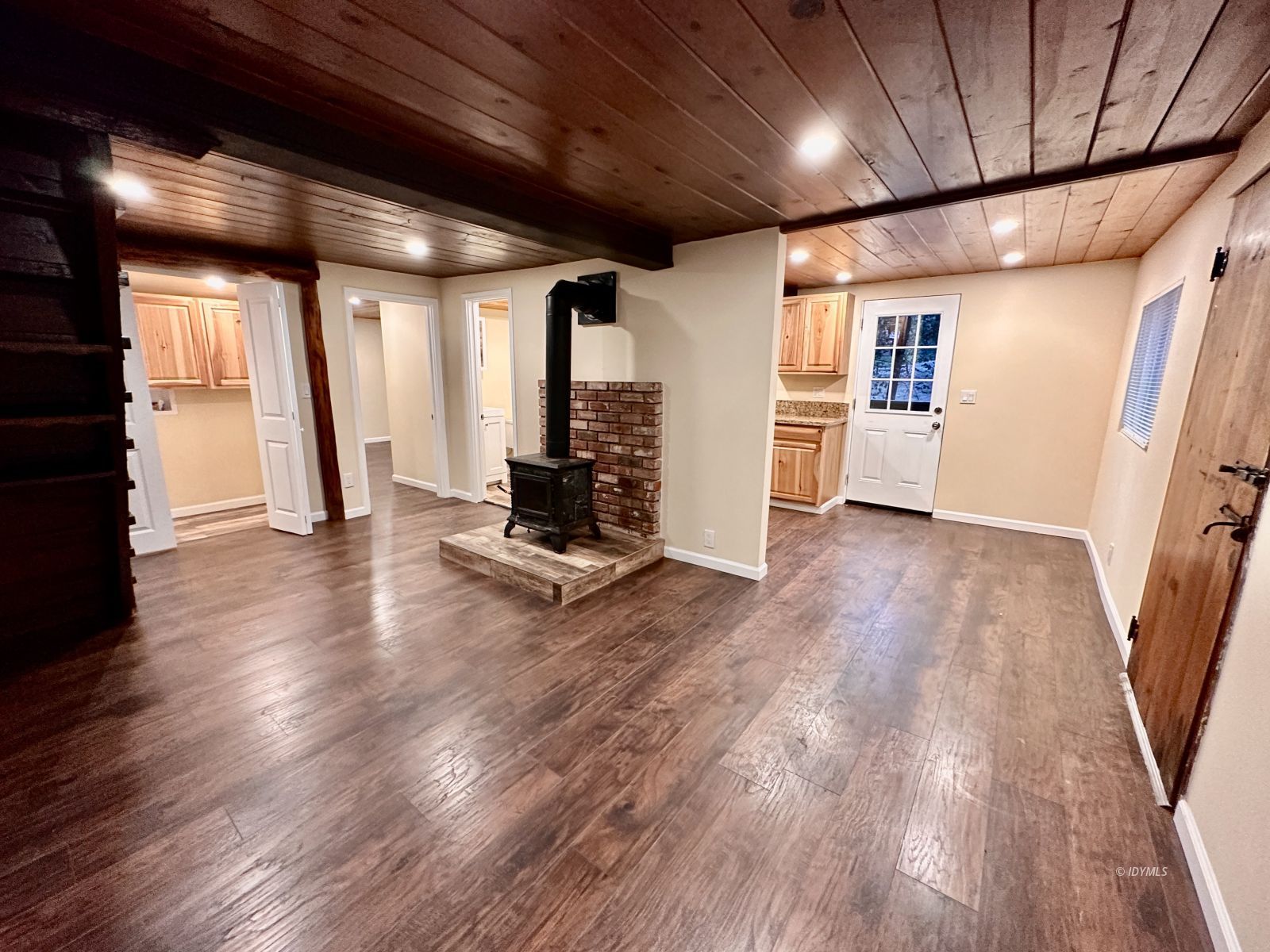 25165 Cedar, Unit A Idyllwild, CA 92549 - Photo 13 of 26 a view of a room with wooden floors