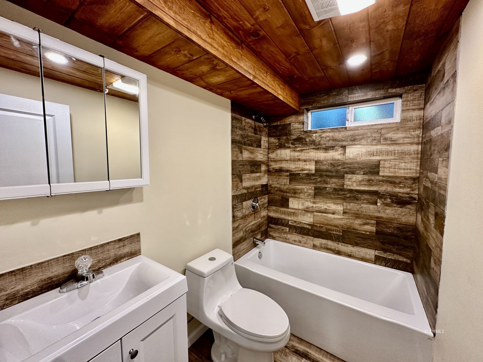 25165 Cedar, Unit A Idyllwild, CA 92549 - Photo 17 of 26 a bathroom with a sink a toilet and shower