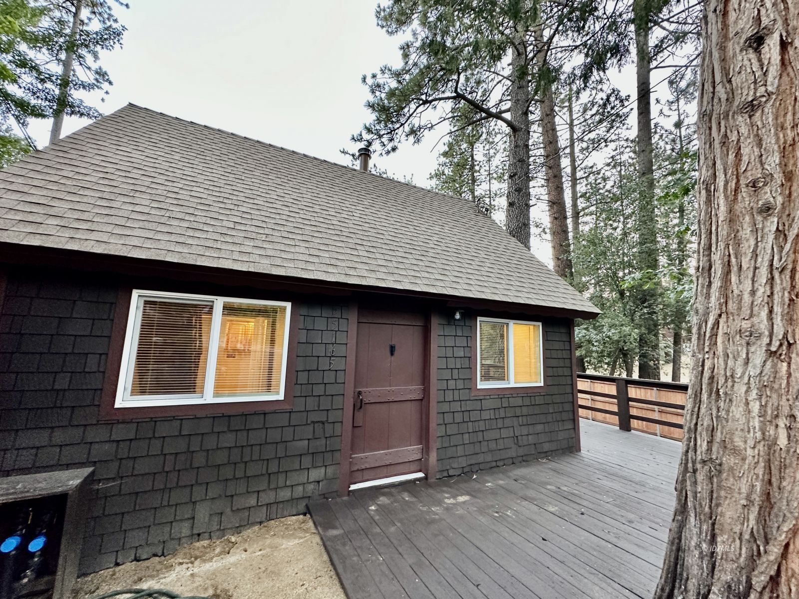 25165 Cedar, Unit A Idyllwild, CA 92549 - Photo 2 of 26 a front view of a house with windows