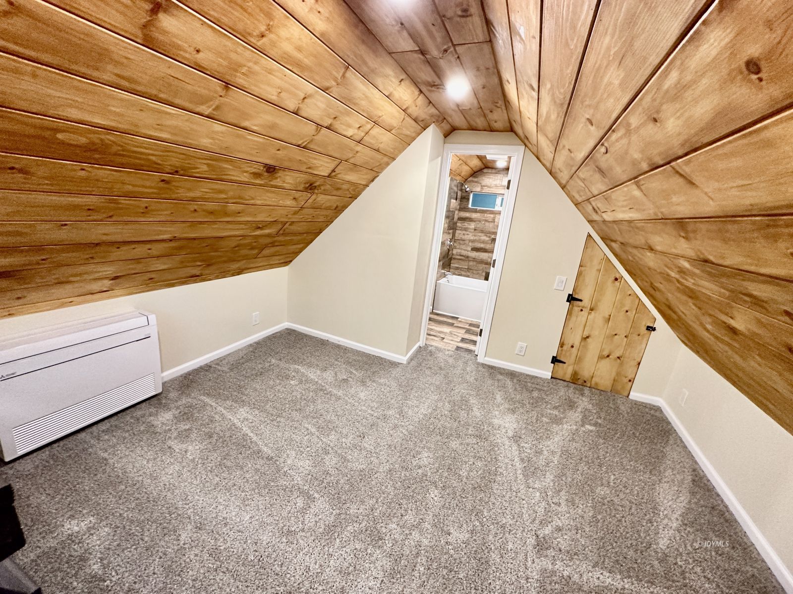 25165 Cedar, Unit A Idyllwild, CA 92549 - Photo 22 of 26 a view of a room with stairs and wooden floor
