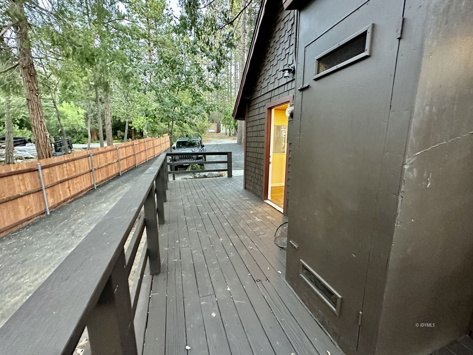 25165 Cedar, Unit A Idyllwild, CA 92549 - Photo 6 of 26 a balcony with wooden floor