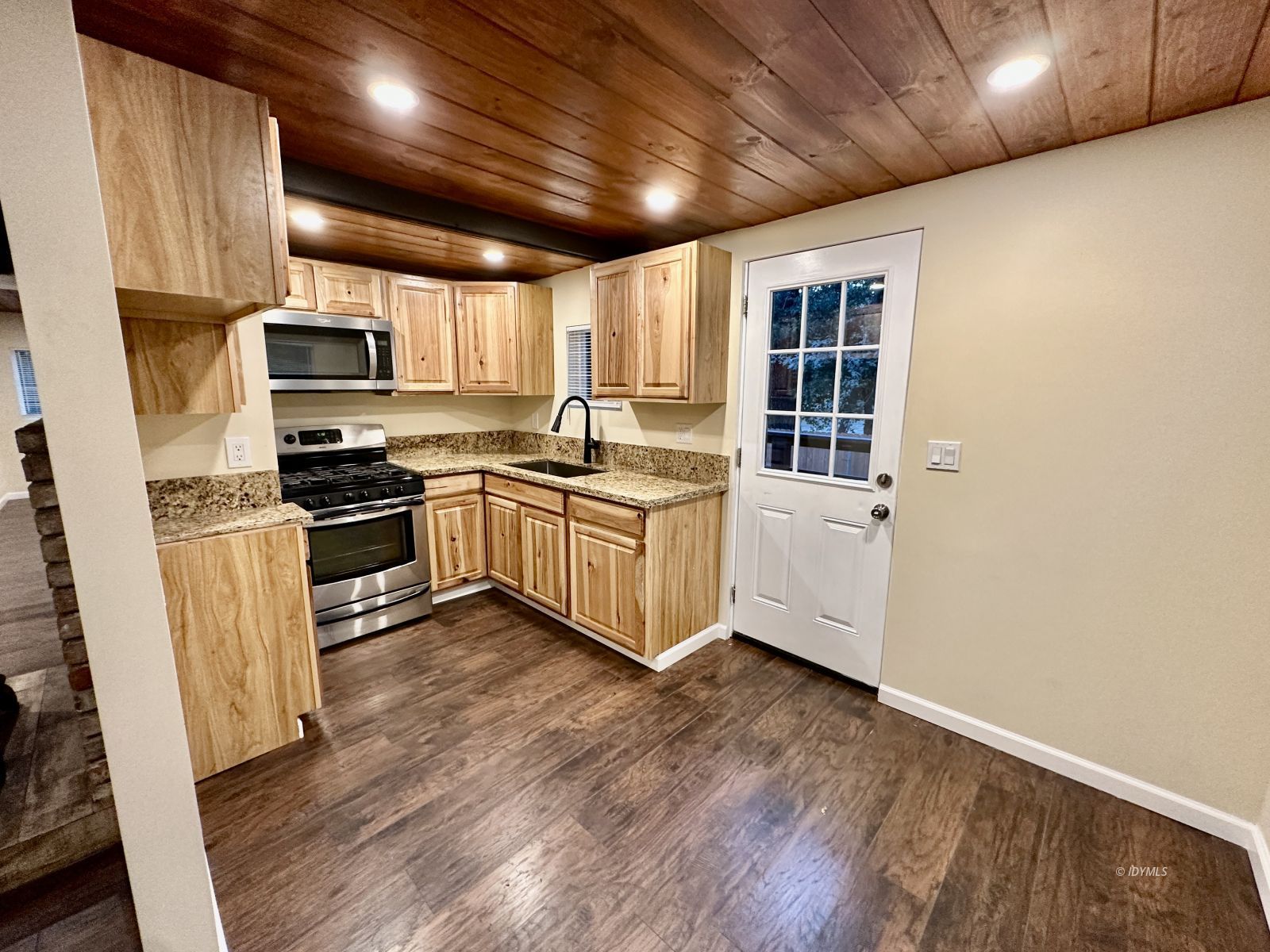 25165 Cedar, Unit A Idyllwild, CA 92549 - Photo 8 of 26 a kitchen with stainless steel appliances granite countertop a stove and a sink