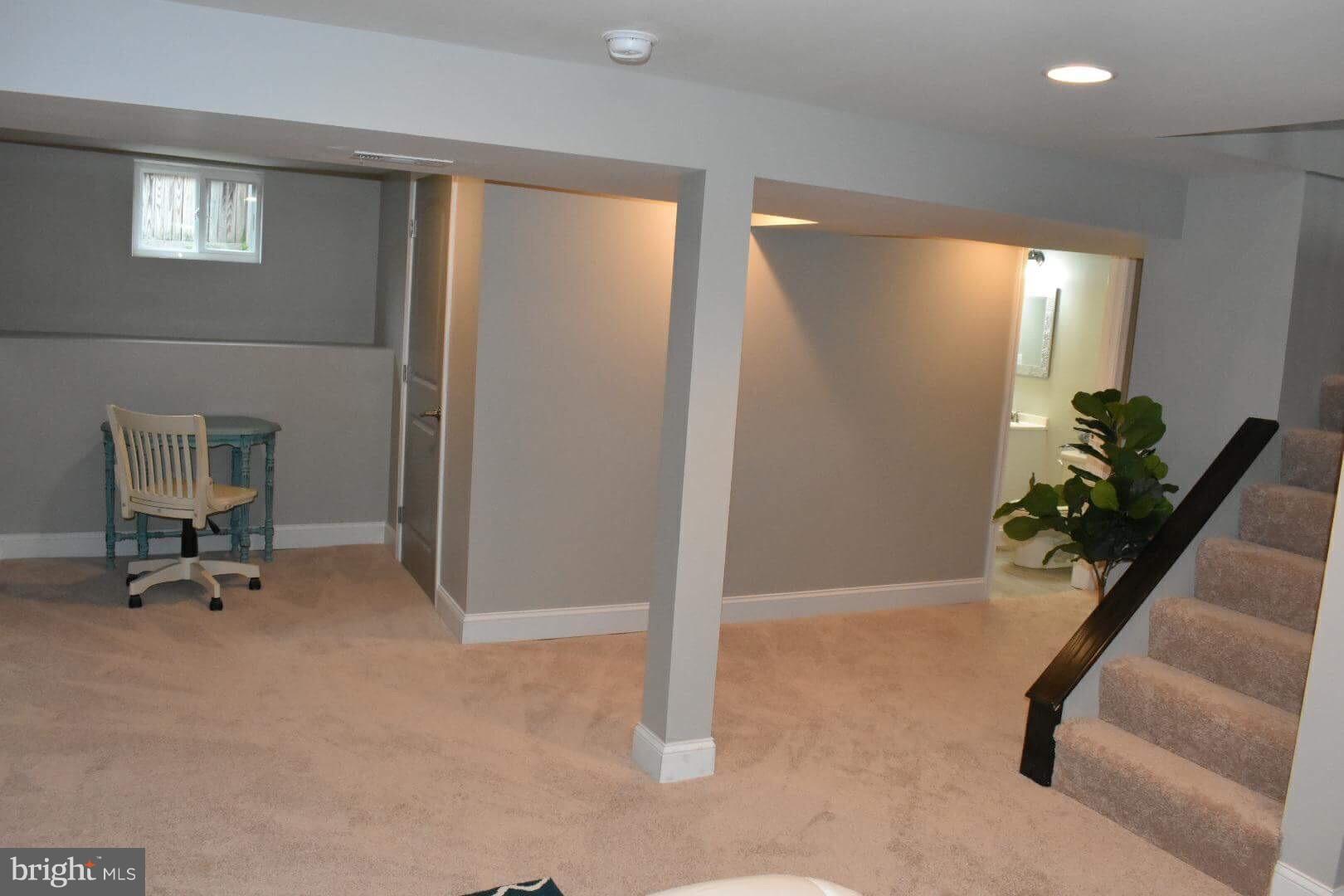 238 Pinewood Road Baltimore, MD 21222 - Photo 14 of 22 a view of an empty room with a window