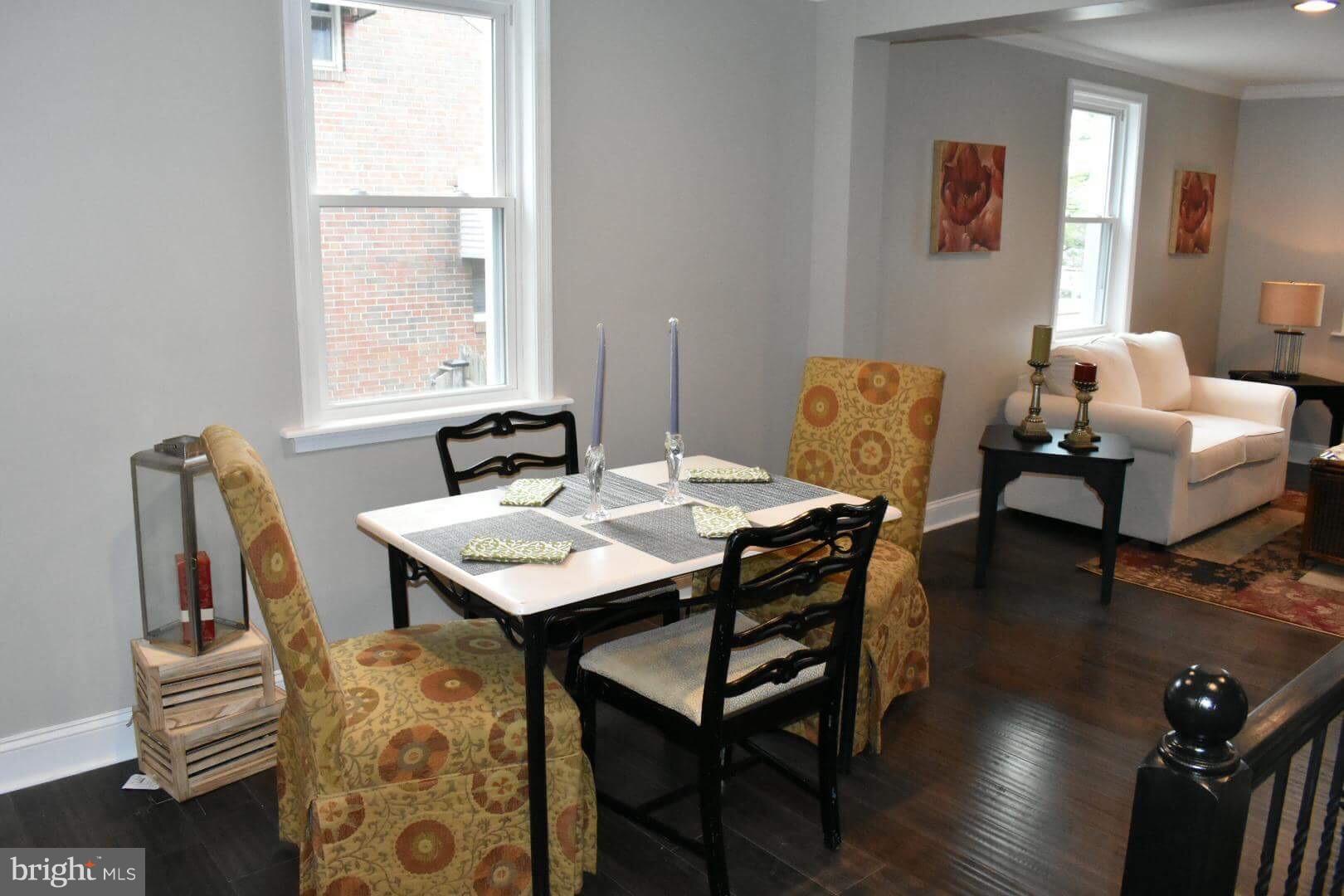 238 Pinewood Road Baltimore, MD 21222 - Photo 6 of 22 a view of a dining room with furniture and wooden floor