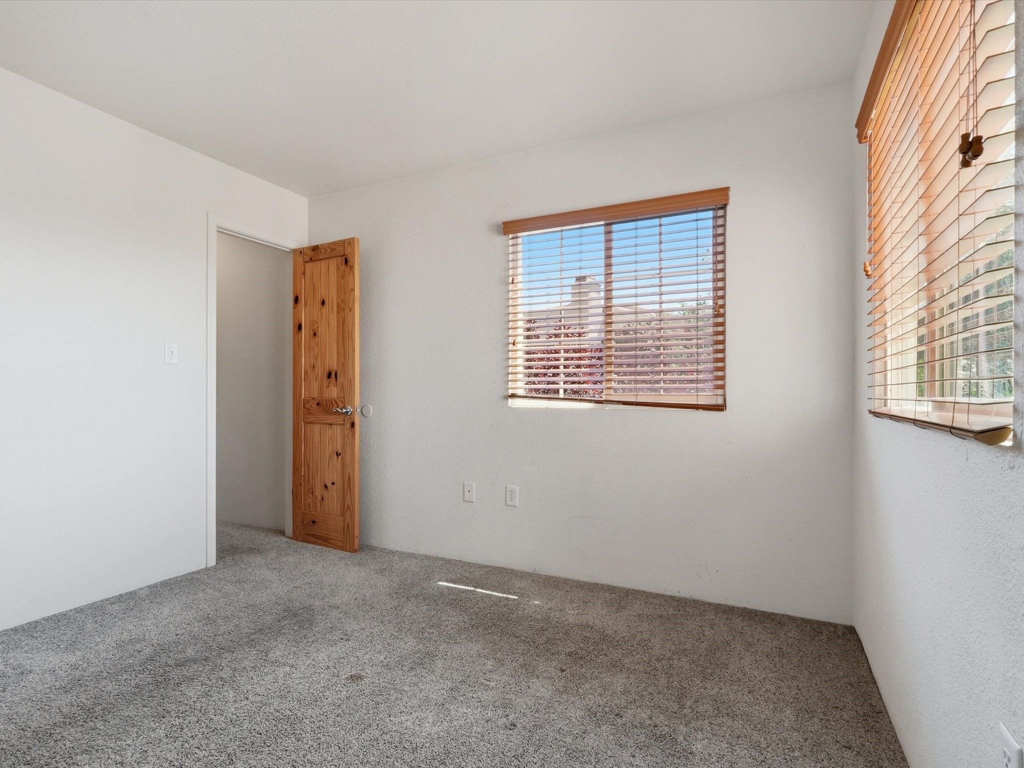 2210 Miguel Chavez Road, Unit 411 Santa Fe, NM 87505 - Photo 22 of 59 The primary bedroom