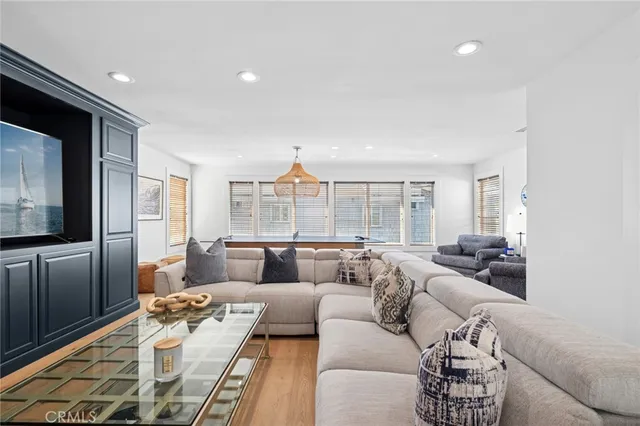 a bedroom with a bed and a chair