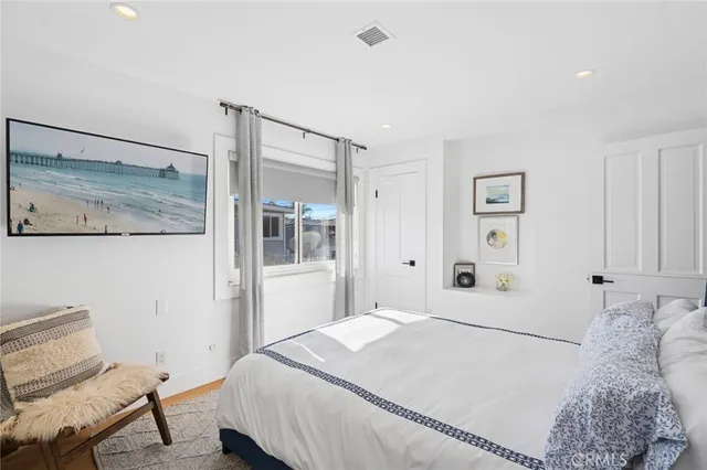 a bathroom with a sink toilet and mirror