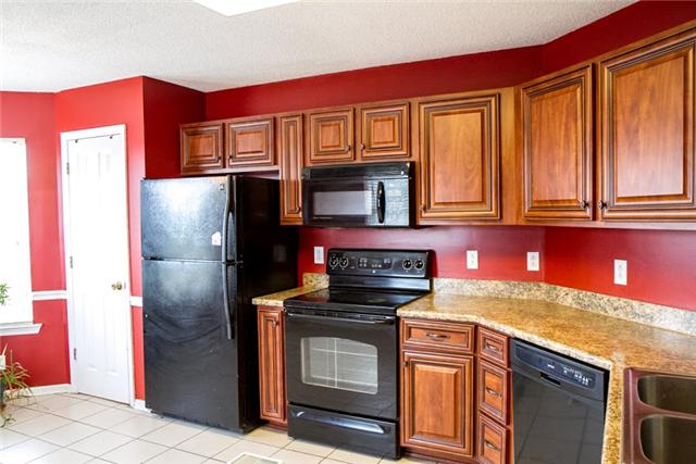 8327 Sims Road Christiana, TN 37037 - Photo 6 of 19 Black Appliance & Wood Cabinets
