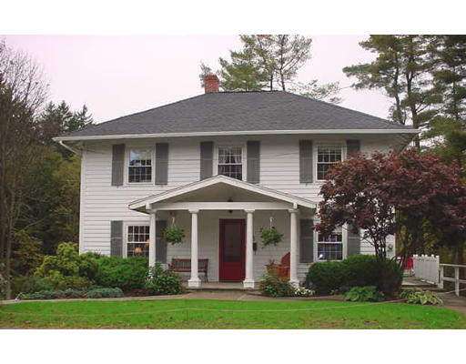 3 Hidden Road Andover, MA 01810 - Photo 1 of 13 a front view of a house with a yard