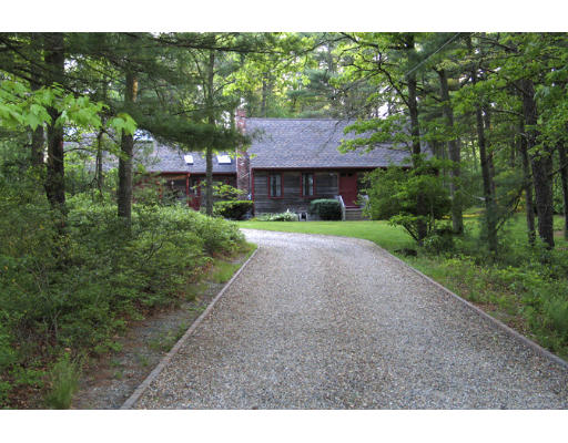 609 Marys Pond Road Rochester, MA 02770 - Photo 1 of 18 a view of a house with a street