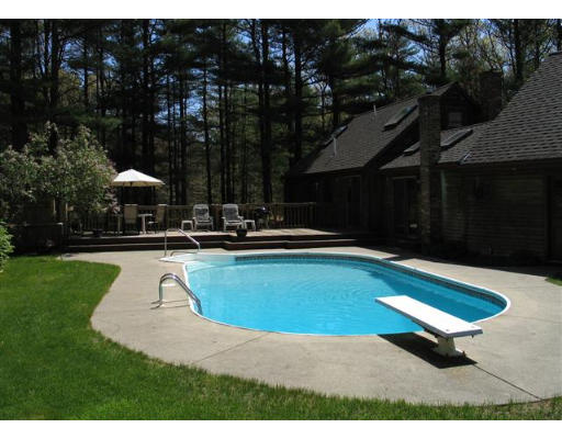 609 Marys Pond Road Rochester, MA 02770 - Photo 16 of 18 a swimming pool with outdoor seating and yard