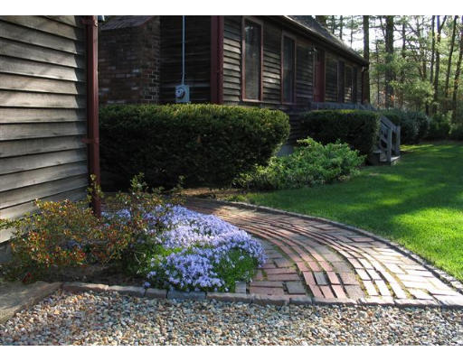 609 Marys Pond Road Rochester, MA 02770 - Photo 18 of 18 a view of a house with a yard
