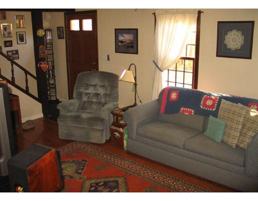 609 Marys Pond Road Rochester, MA 02770 - Photo 10 of 18 a living room with furniture and a window