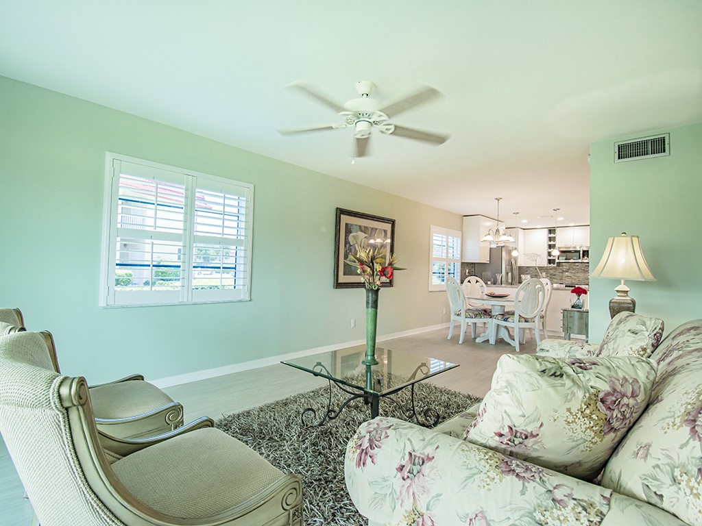 Undisclosed Address Vero Beach, FL 32962 - Photo 11 of 31 a living room with furniture and a window