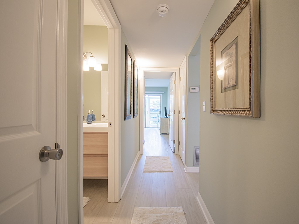 Undisclosed Address Vero Beach, FL 32962 - Photo 12 of 31 a view of a bathroom from a hallway