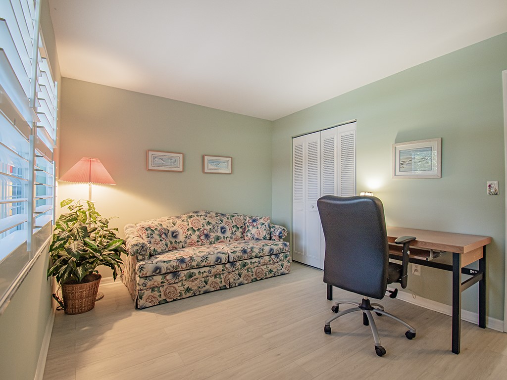 Undisclosed Address Vero Beach, FL 32962 - Photo 14 of 31 a bedroom with a workspace