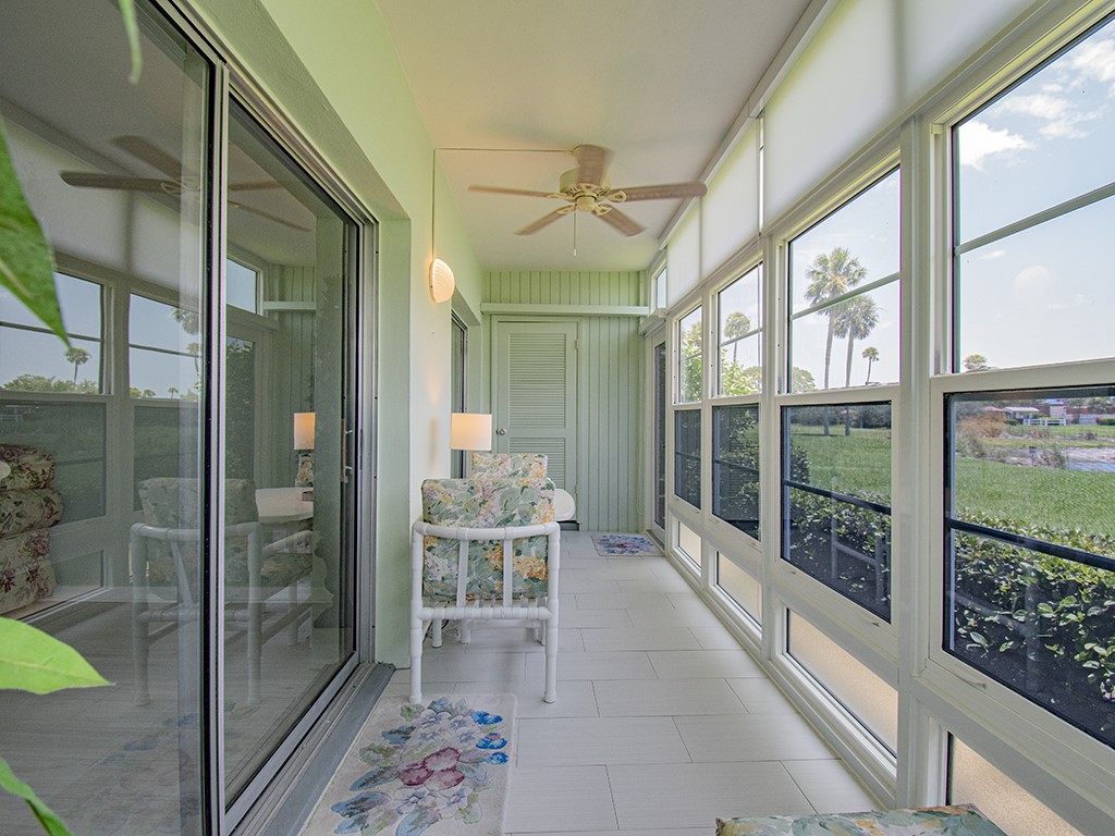 Undisclosed Address Vero Beach, FL 32962 - Photo 22 of 31 a room with window and glass doors