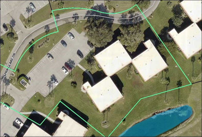 Undisclosed Address Vero Beach, FL 32962 - Photo 25 of 31 an aerial view of a house with a yard
