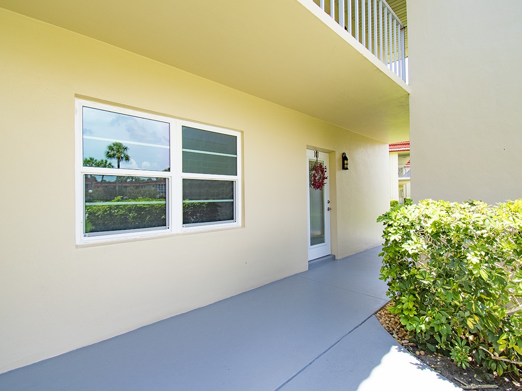 Undisclosed Address Vero Beach, FL 32962 - Photo 3 of 31 a view of front door of house