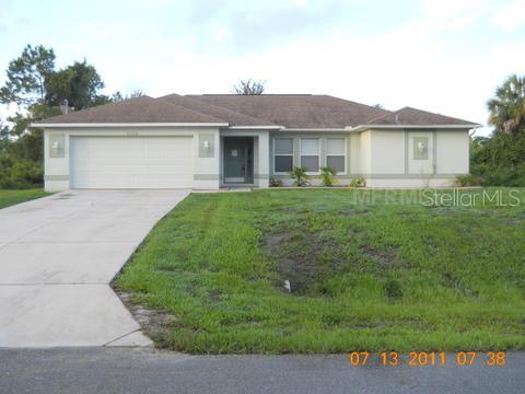 5159 Abdella Lane North Port, FL 34291 - Photo 1 of 1 front view of a house with a yard