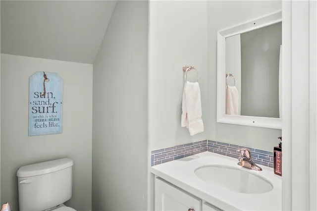 a bathroom with a sink and a toilet