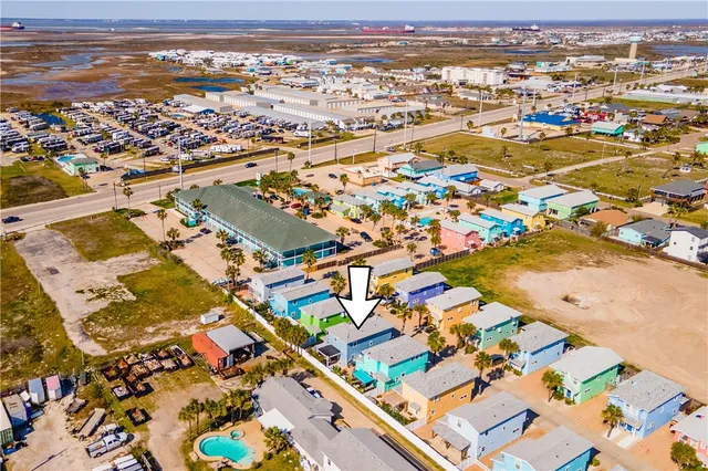 an aerial view of residential building with parking space