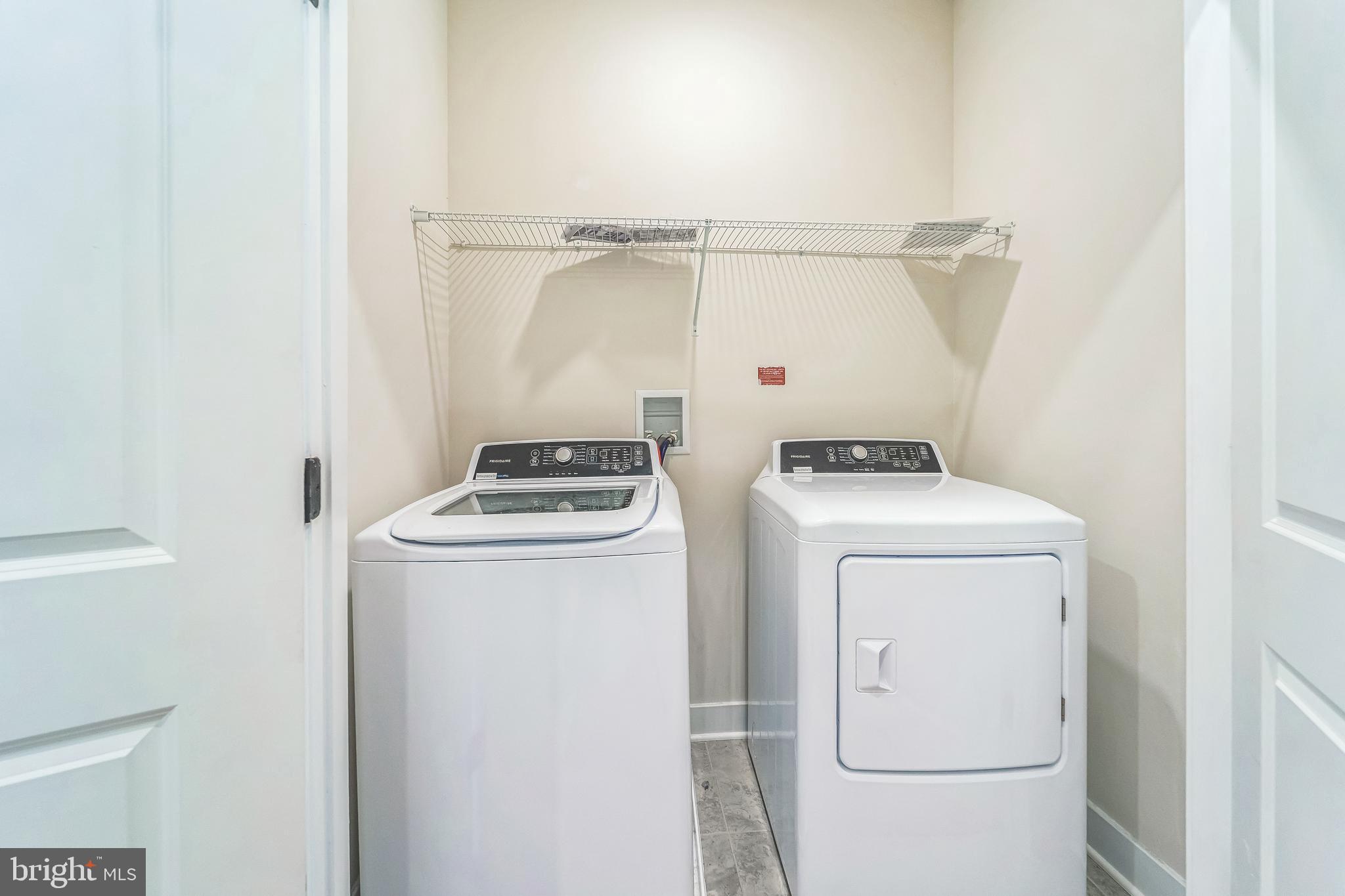 4306 Roland Heights Avenue Baltimore, MD 21211 - Photo 28 of 32 Laundry on upper level