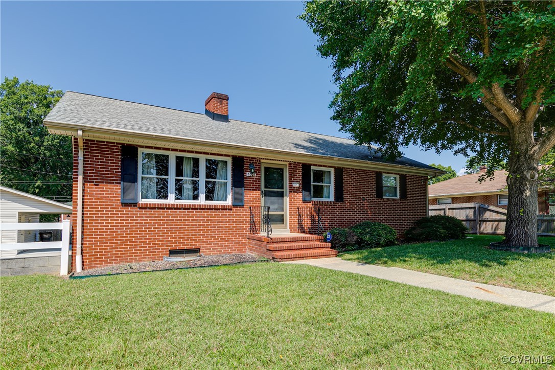 3307 Walnut Street Hopewell, VA 23860 - Photo 1 of 38 a front view of a house with a yard