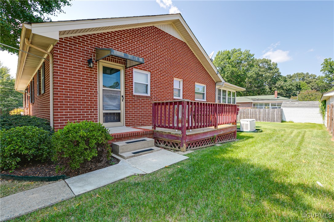 3307 Walnut Street Hopewell, VA 23860 - Photo 11 of 38 a view of backyard with a garden and deck