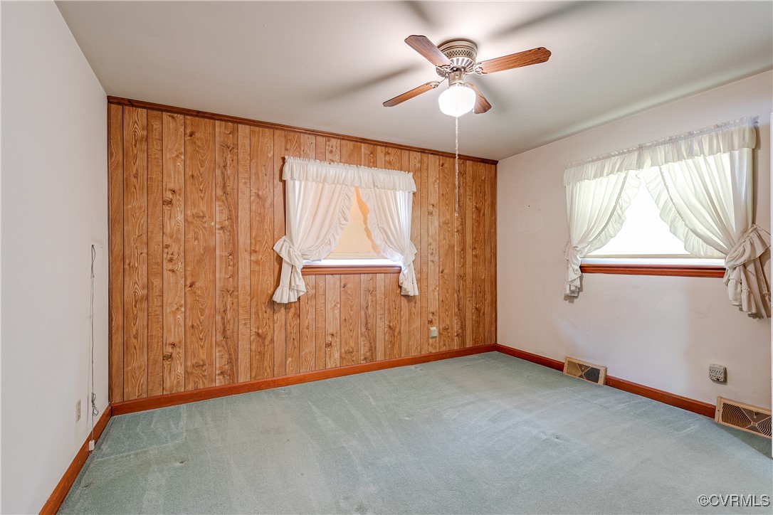 3307 Walnut Street Hopewell, VA 23860 - Photo 26 of 38 an empty room with windows and fan