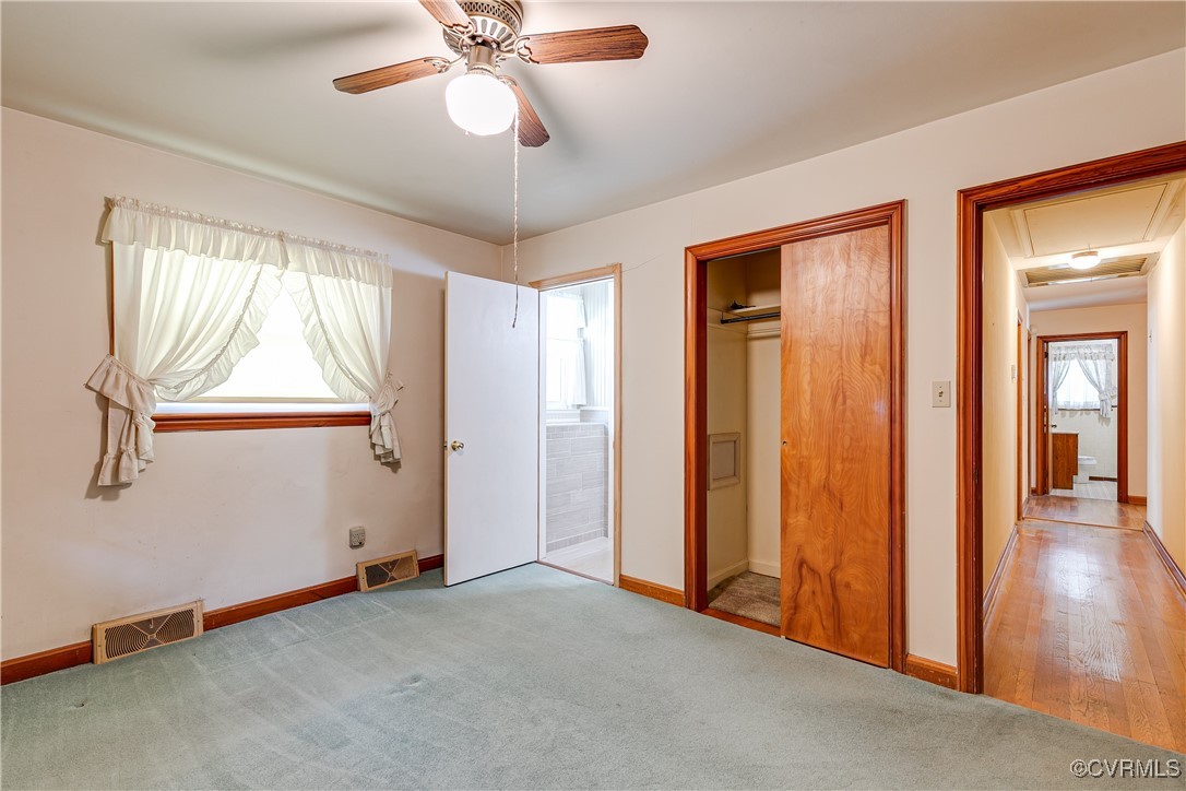 3307 Walnut Street Hopewell, VA 23860 - Photo 27 of 38 an empty room with wooden floor closet and windows