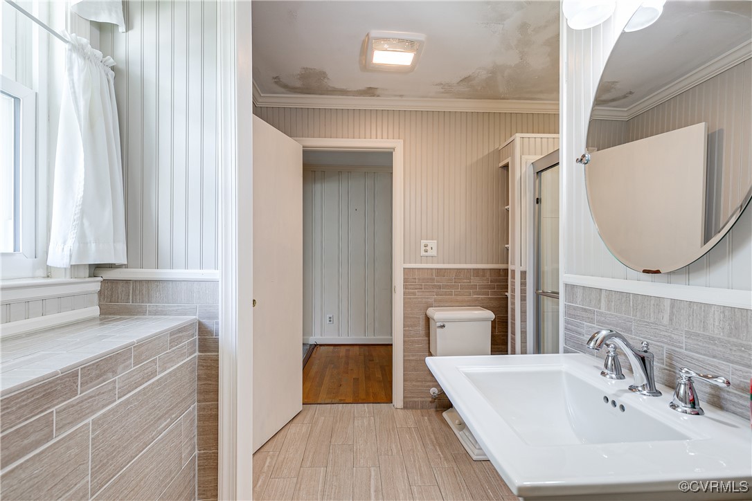 3307 Walnut Street Hopewell, VA 23860 - Photo 28 of 38 a bathroom with a sink and a mirror